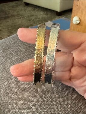 2 Simon Sebbag Hammered Sterling Silver Bangles. 1 is Silver and 1 is Gold.